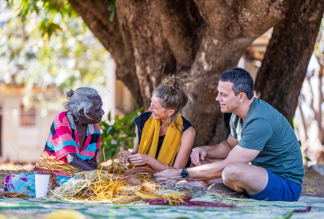 Kakadu Billabong Safari Camp Indigenous Artist Weaving with Visitors