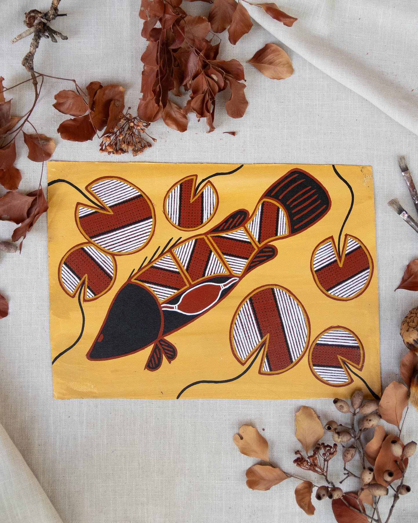 Authentic aboriginal artwork featuring barramundi
