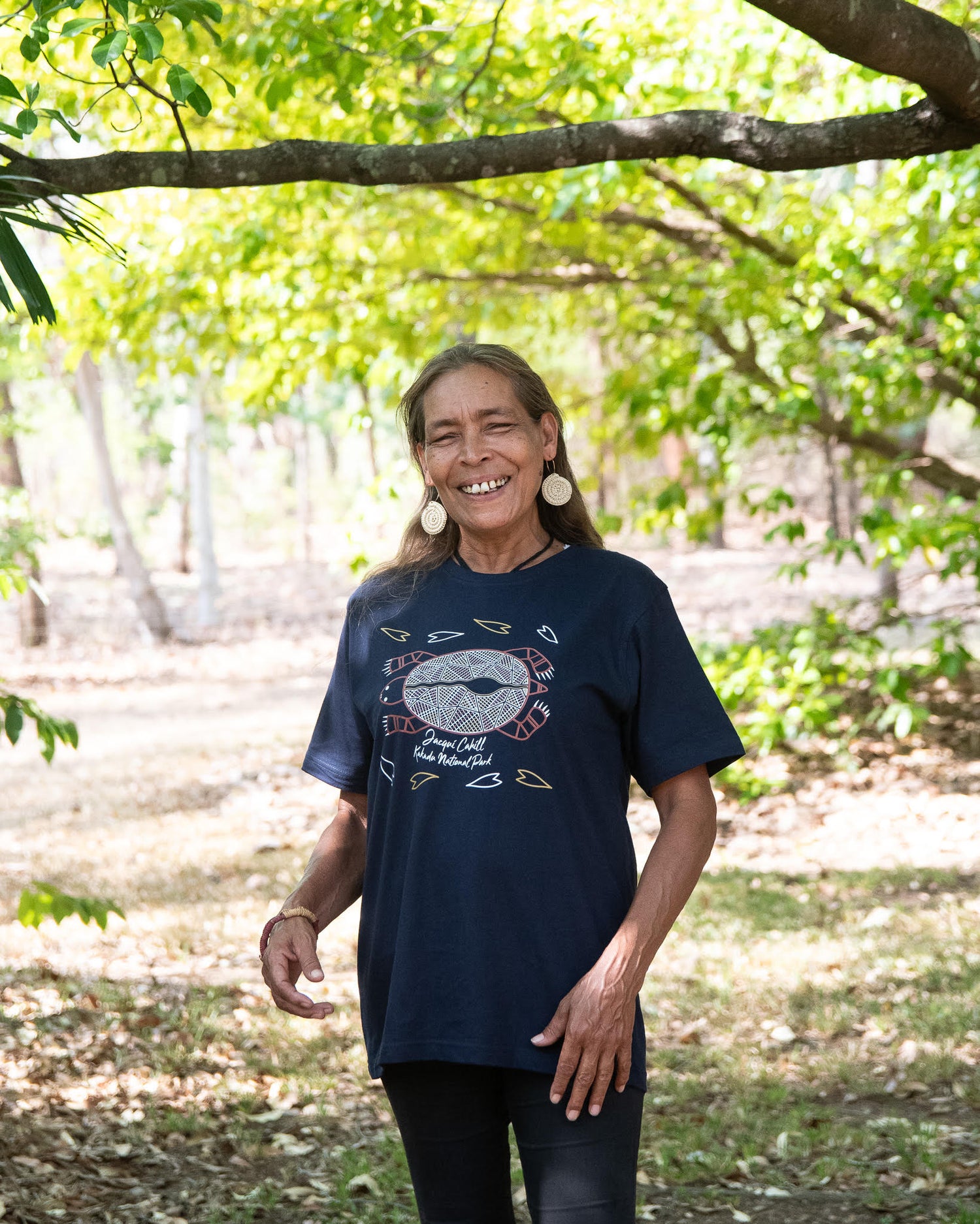 Murumburr Traditional Custodian Eva Pettersson wears Aboriginal art clothing t-shirt